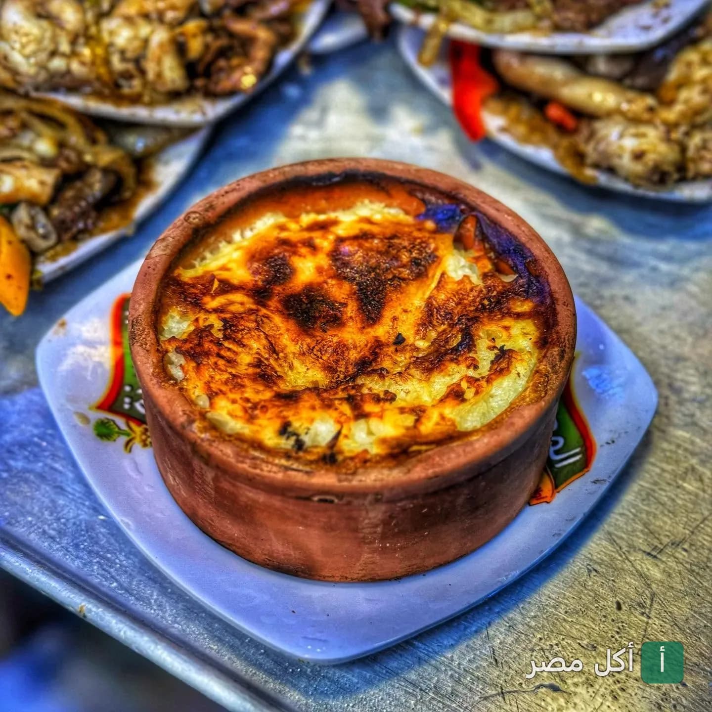 طاجن أرز معمر محمر في مطعم المدينة بالأزبكية