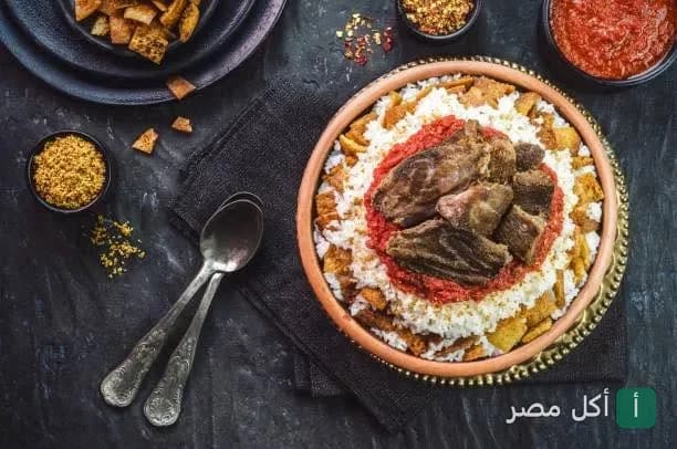فتة موزة ضاني في طاجن فخار من مطعم بلدينا بالبساتين