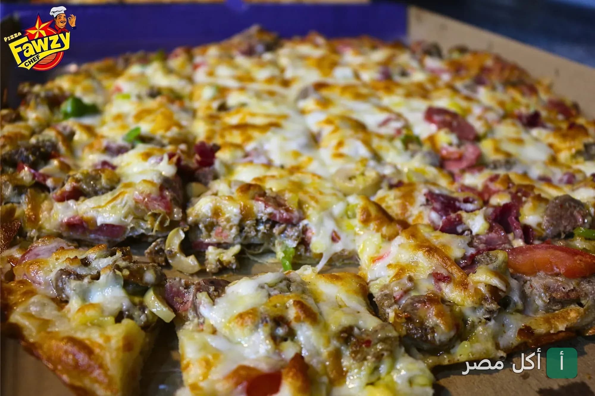 بيتزا باللحم والجبن السايح من مطعم بيتزا فوزي شيف في مساكن الجوهرة ببورسعيد.