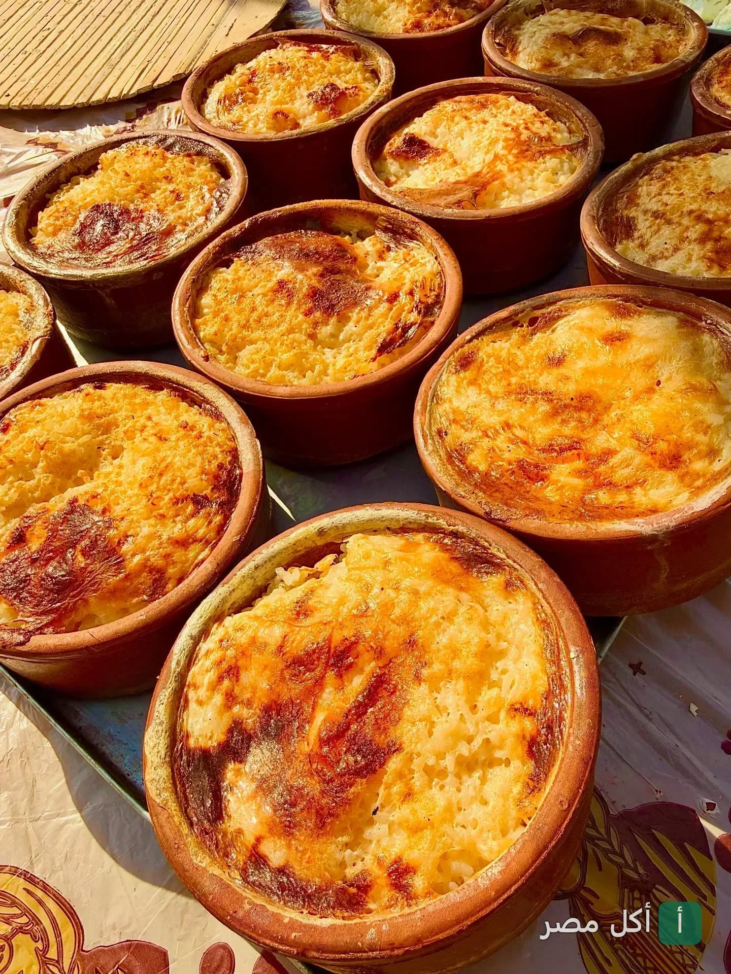 طواجن أرز معمر محمرة في قرية ستو ببورسعيد.