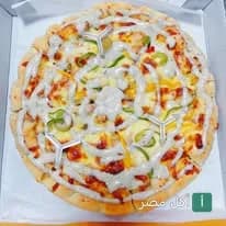 بيتزا بالخضروات والصوص الأبيض من مطعم مستر تيست في عين شمس