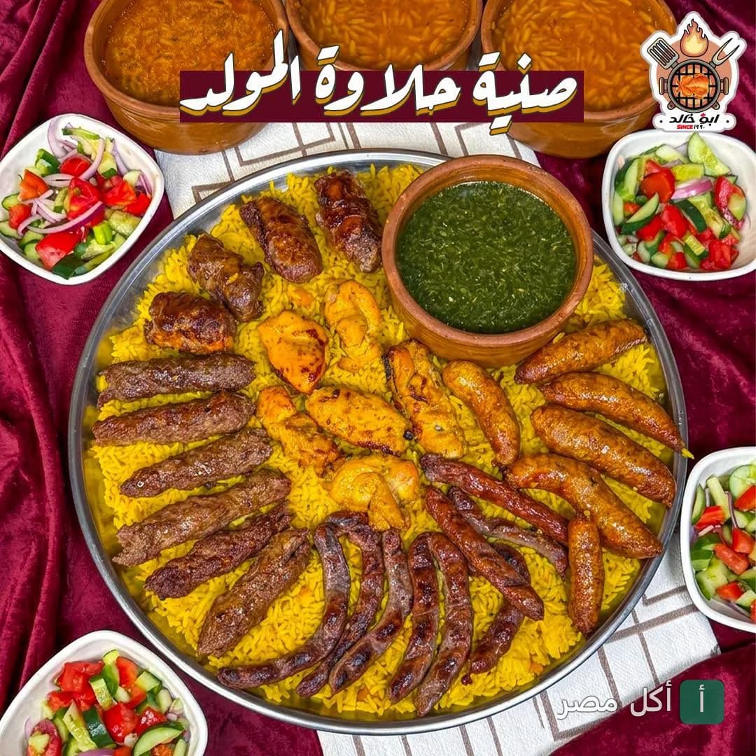 صينية مشويات متنوعة من كبابجي أبو خالد في عين شمس مع أرز ومقبلات