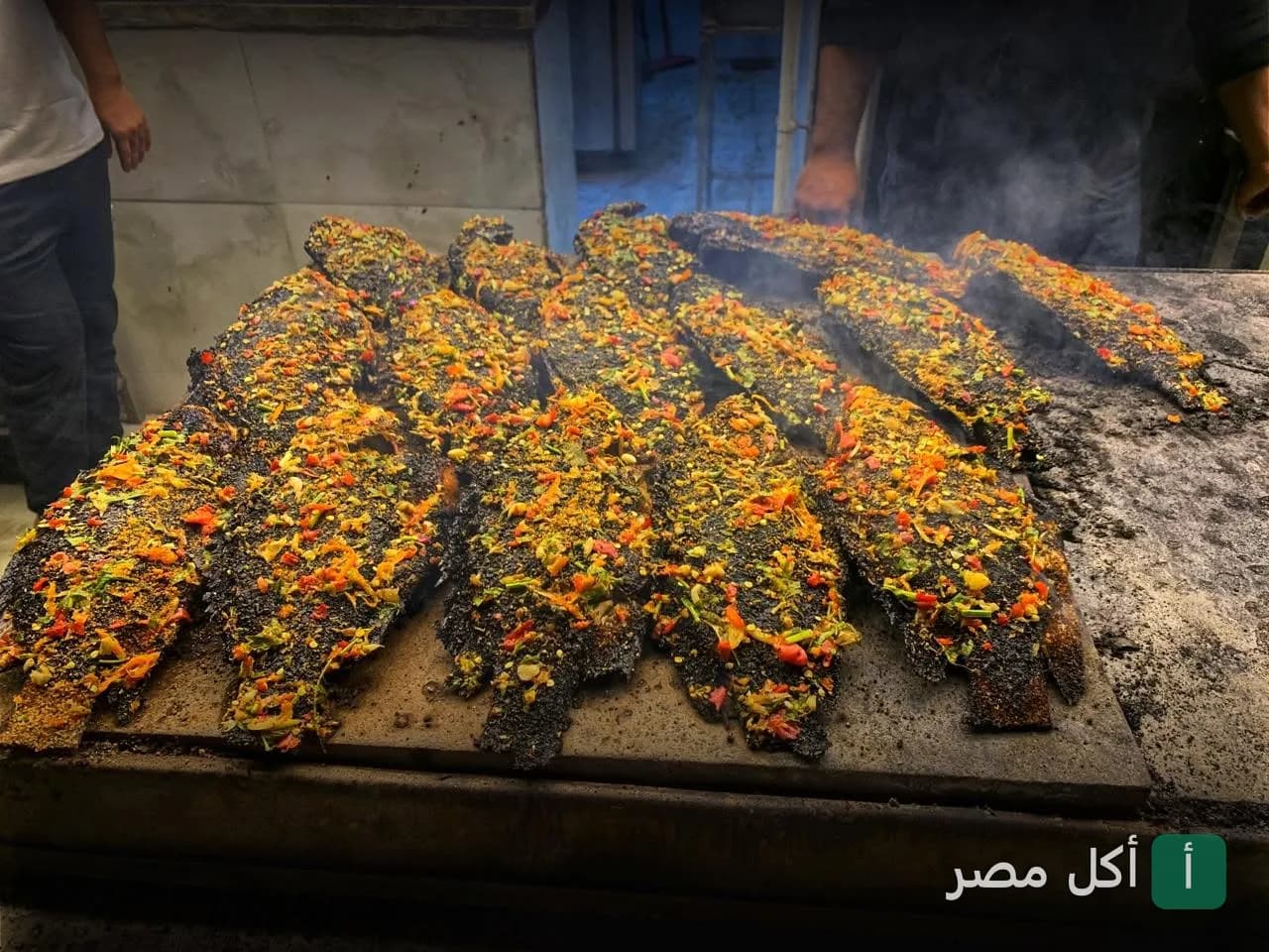 سمك مشوي بالخلطة على الجريل في مطعم الشامي للأسماك بالخليفة