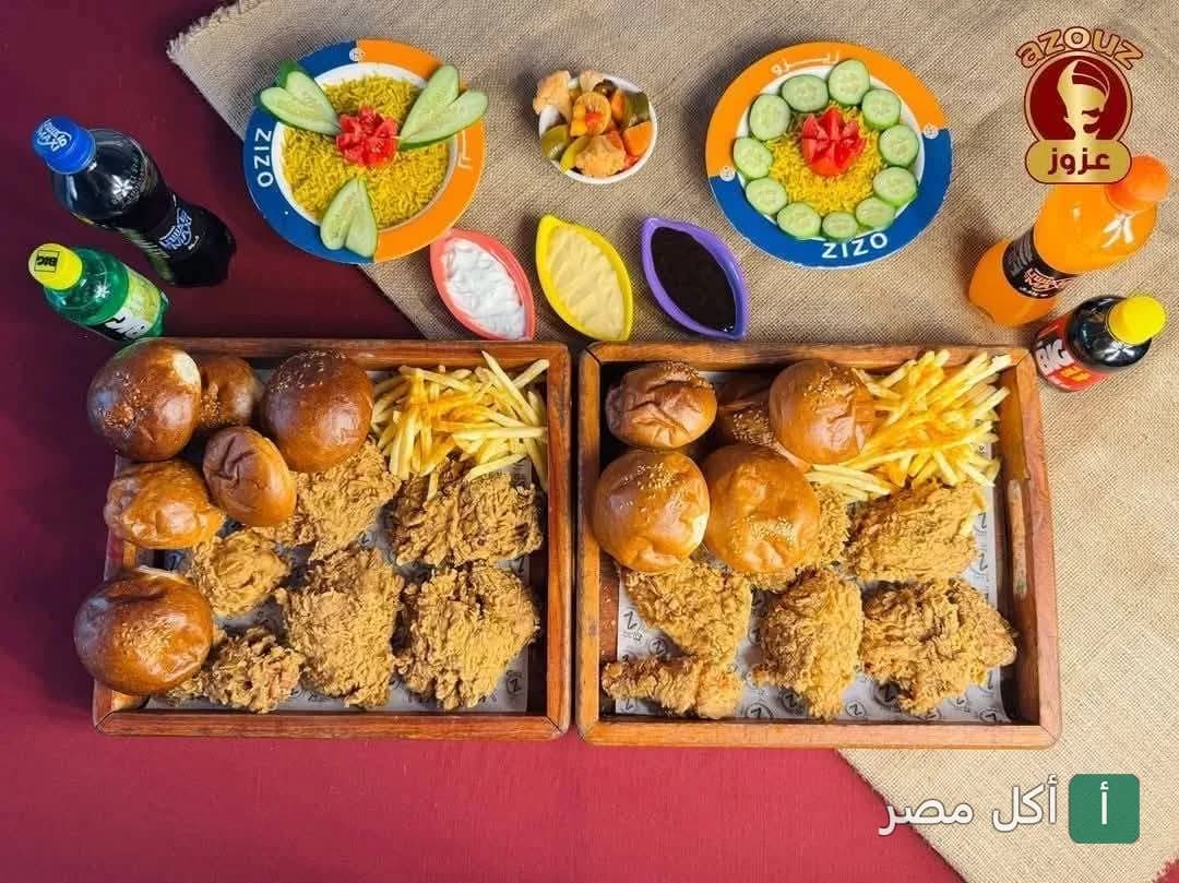 وجبة دجاج مقلي مع أرز ومقبلات ومشروبات من مطعم محمد عزوز الريدي في أطفيح