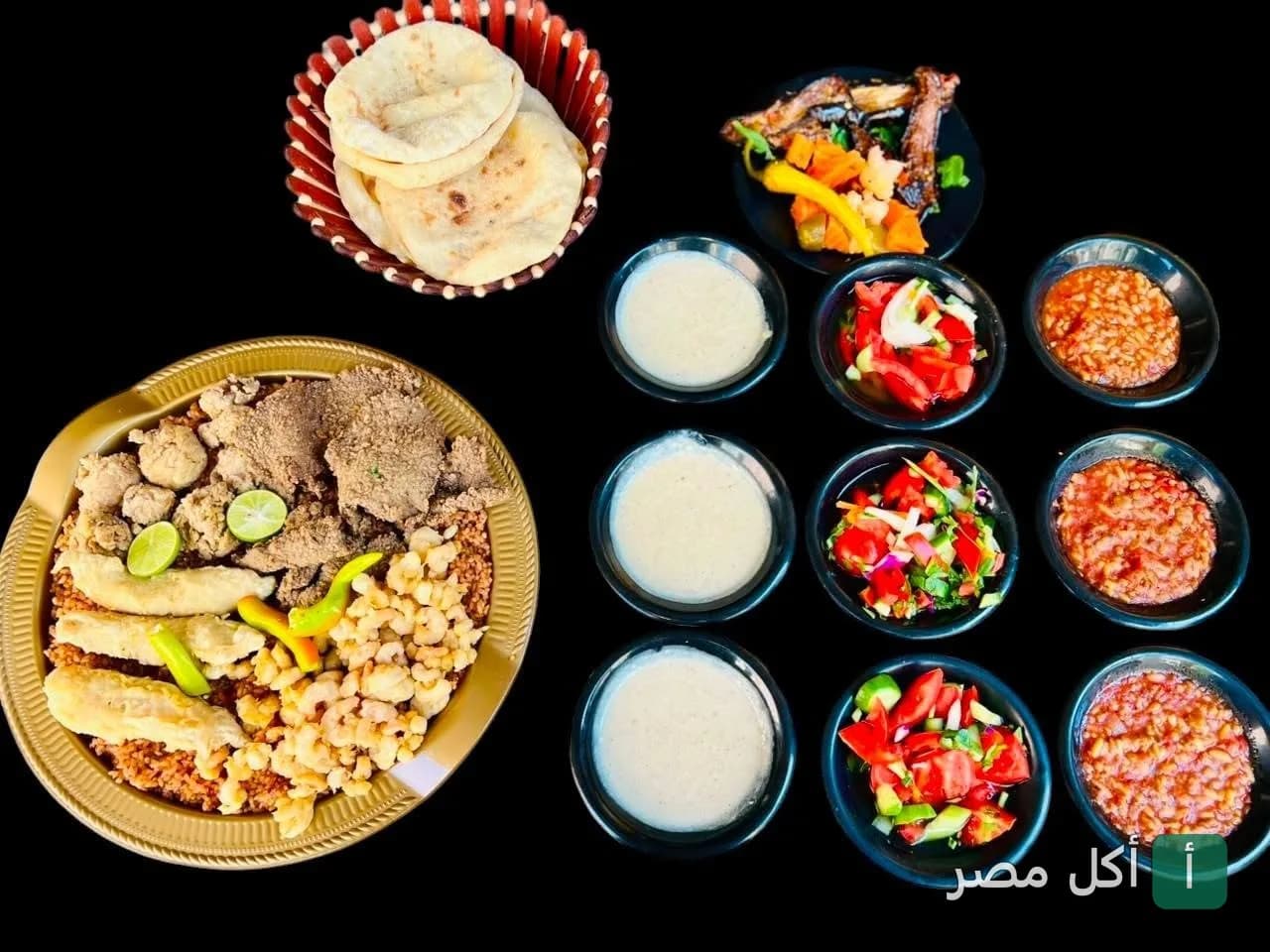 طبق مشكل كبدة ومخ مع مقبلات وسلطات في مطعم كبدة ومخ اولاد مهران ببولاق الدكرور