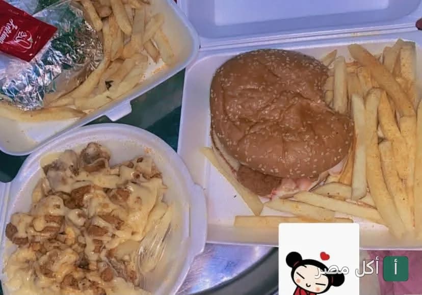 وجبات تيك أواي من مستر زيزو في بولاق الدكرور تضم برجر وبطاطس مقلية ووجبة دجاج بالجبنة