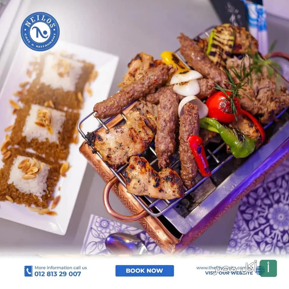 مشويات مشكلة من مطعم نايلوس بالجيزة تقدم على شواية نحاسية مع أرز بالمكسرات