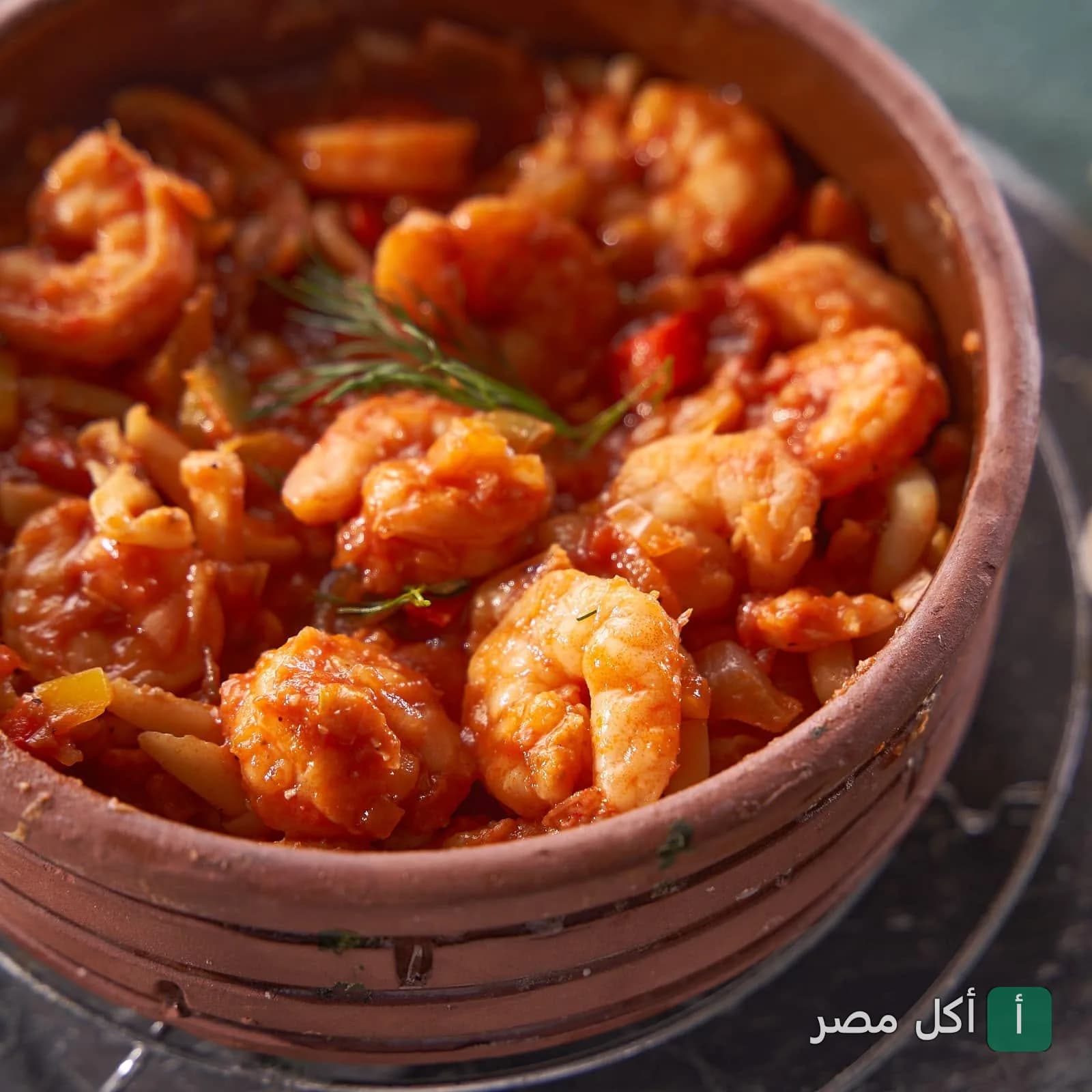 طاجن جمبري بصلصة الطماطم في مطعم أكلة سمك بالشيخ زايد