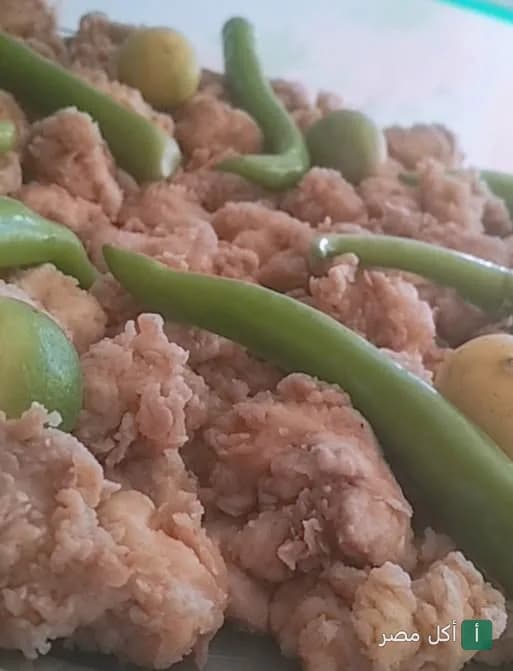 طبق كبدة مطهو مع الفلفل الأخضر والليمون من مطعم نص كبده في الأهرام.